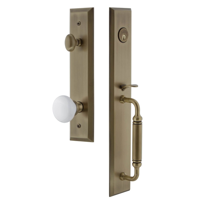 Fifth Avenue One-Piece Handleset with C Grip and Hyde Park Knob in Vintage Brass